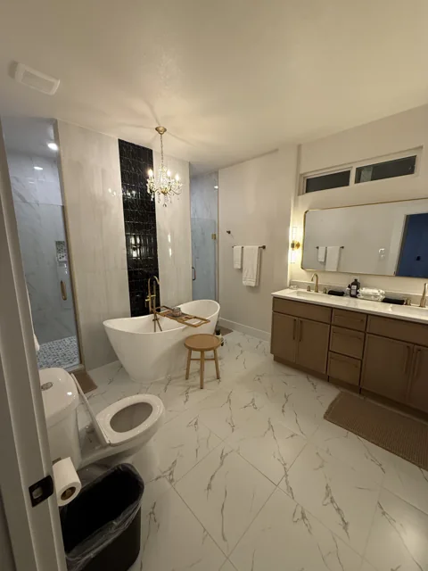 Room 3 ensuite with freestanding tub, shower, and vanity